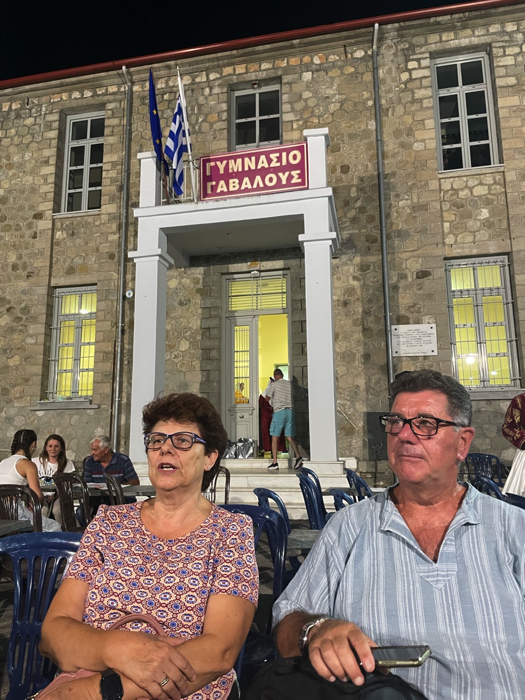 Our friends Ioannis and Ionannina watch the folk dancing at Gavalou High School (Γυμνάσιο Γαβαλούς)