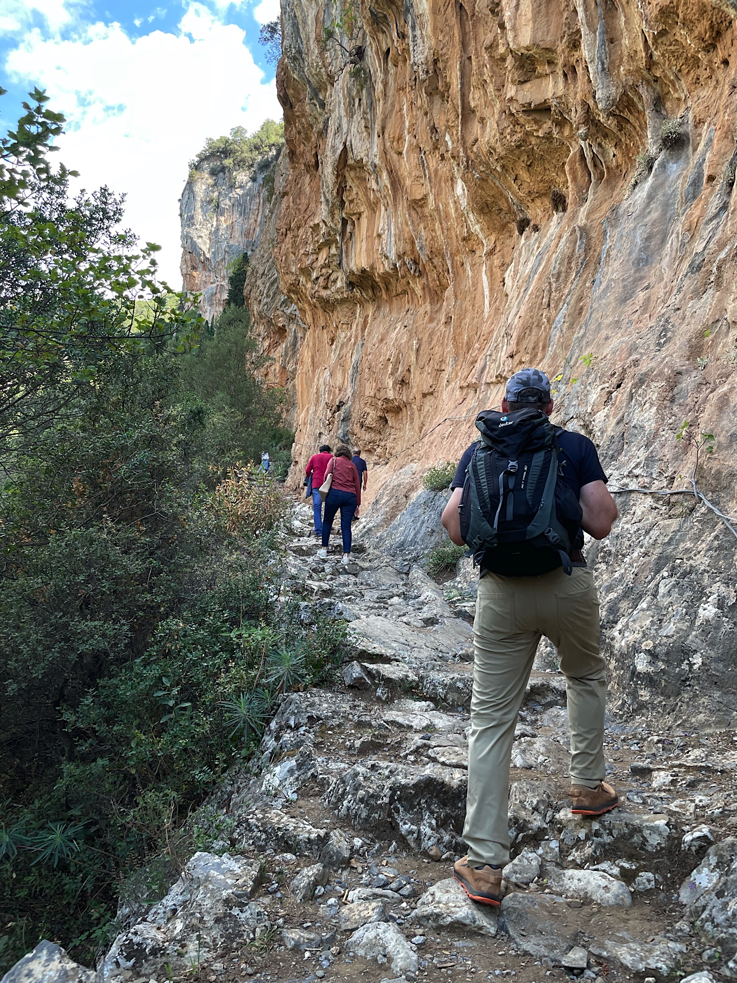 The trail is carved into the cliff face, too.