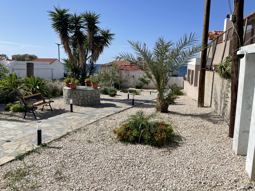 It was separated from the street-front house by a large garden.