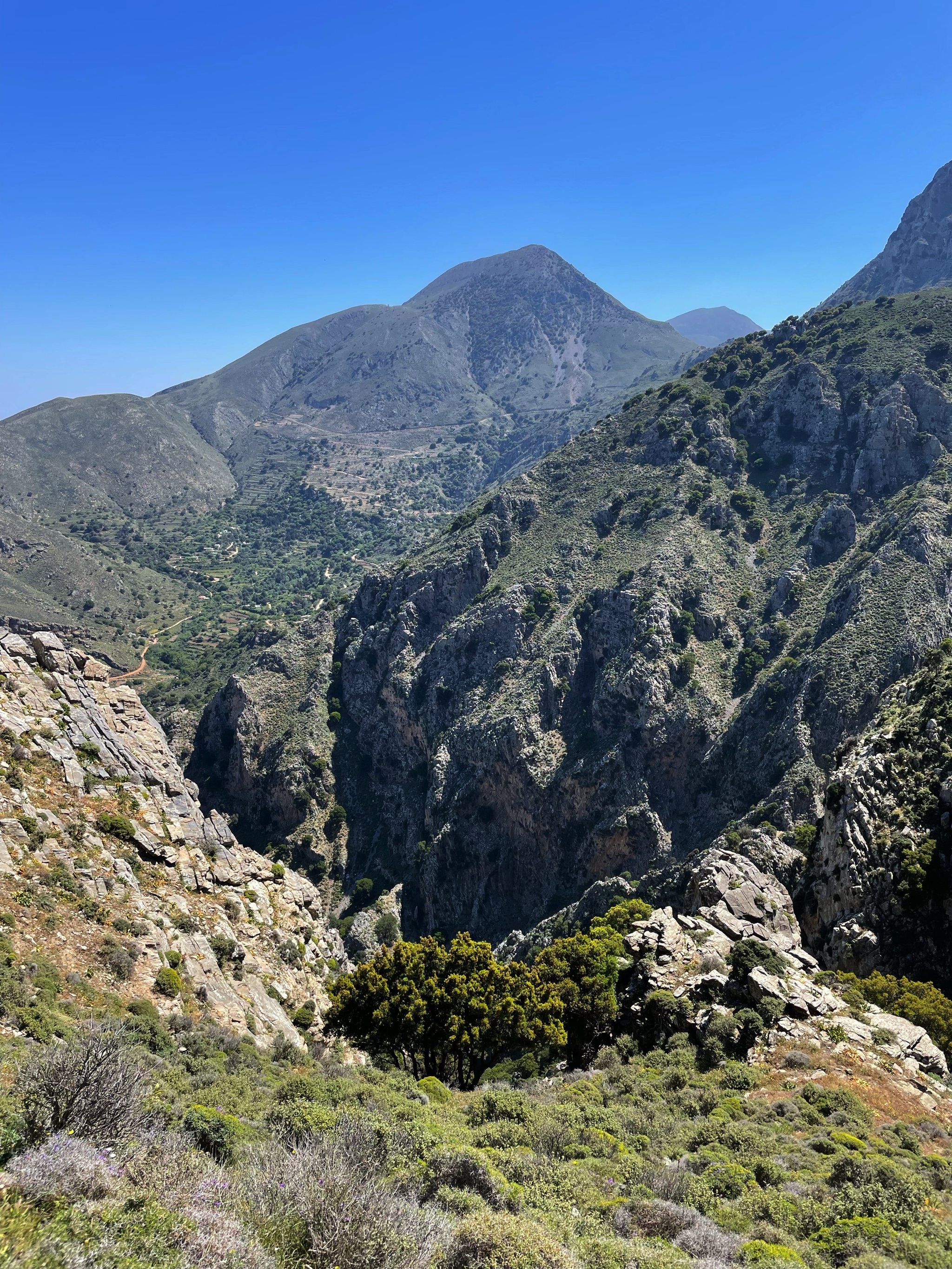 At its top, the path to the kastro crosses a little pass to get to the east side of the mountain.