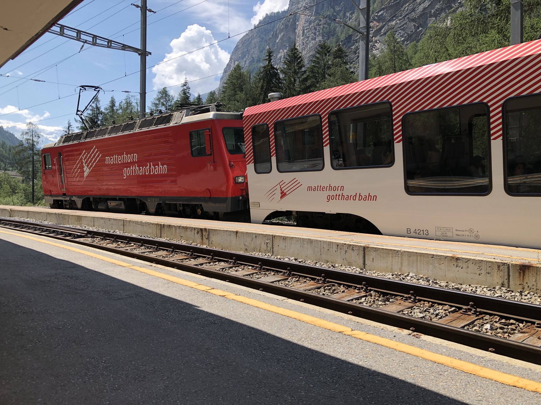 These stations are unmanned. You press a button to get the train to stop.