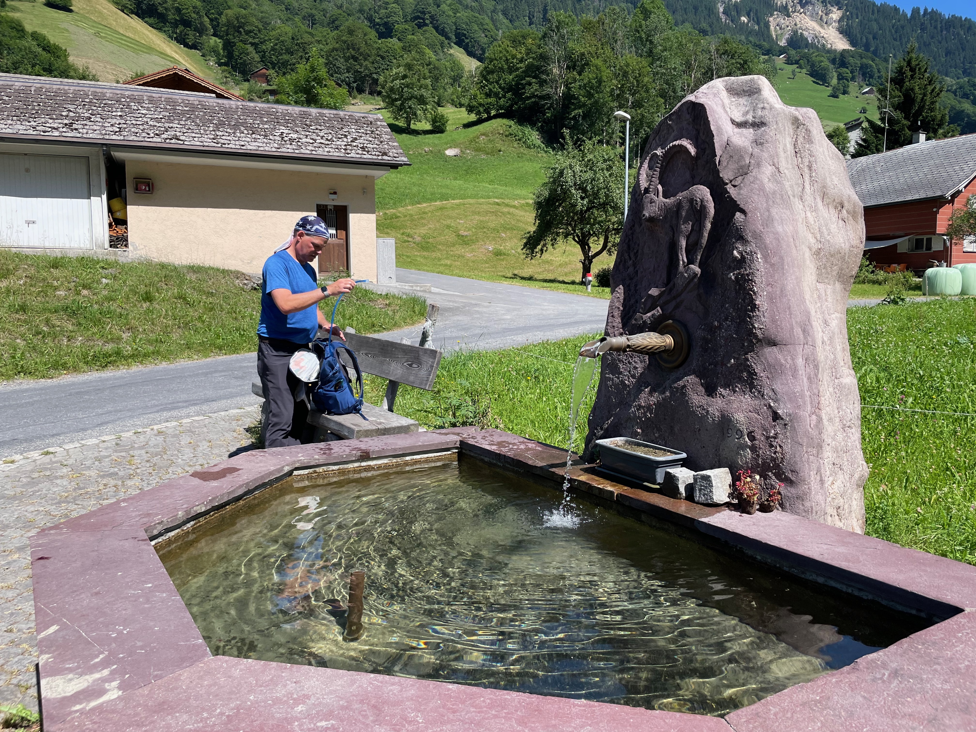 We stopped to fill our water blivets at a fountain.