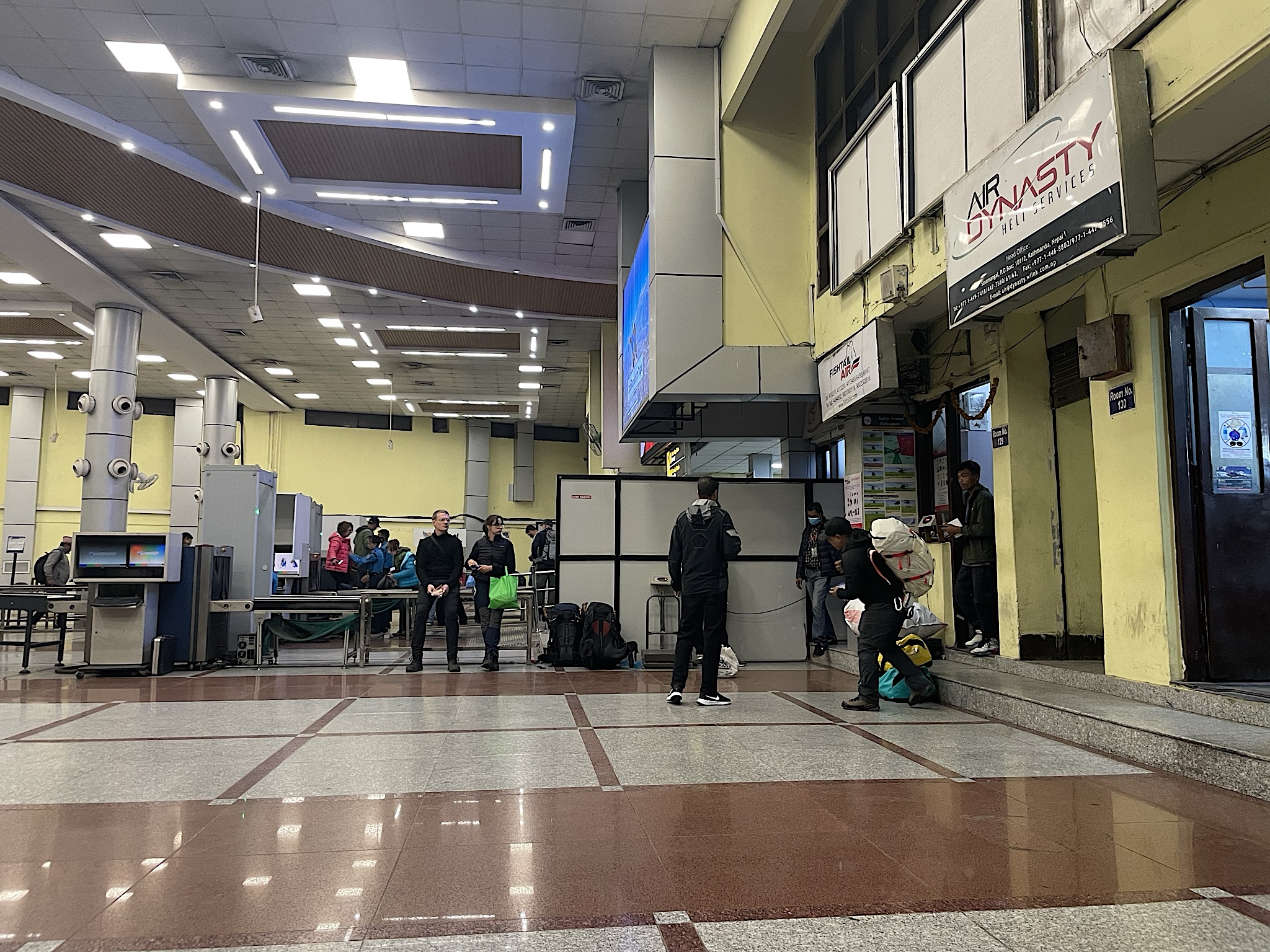 The domestic airport is pretty chill early in the morning. Most flights to the mountains leave from Ramenchap instead.