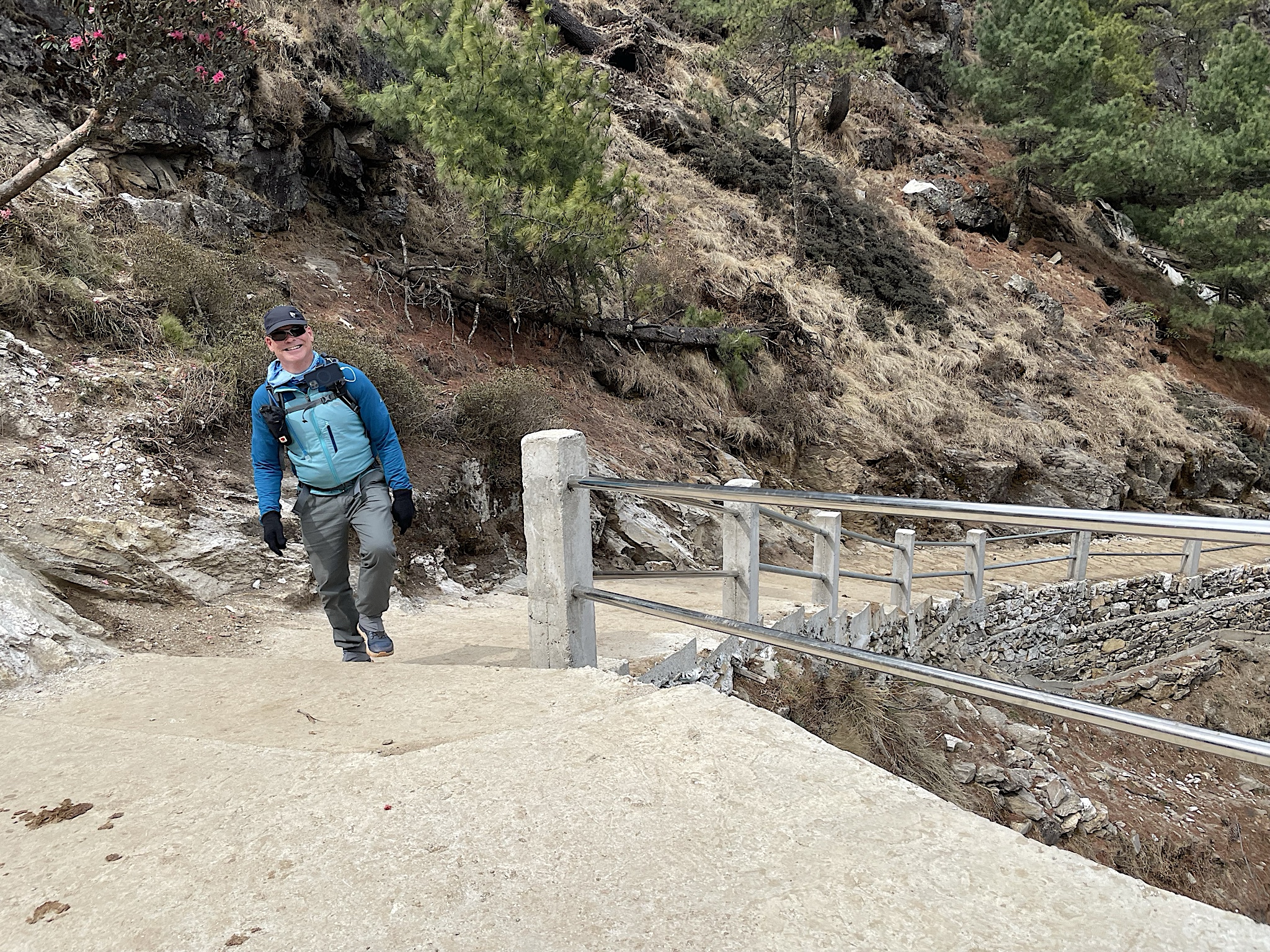 The stairs right after the bridge are new concrete structures.