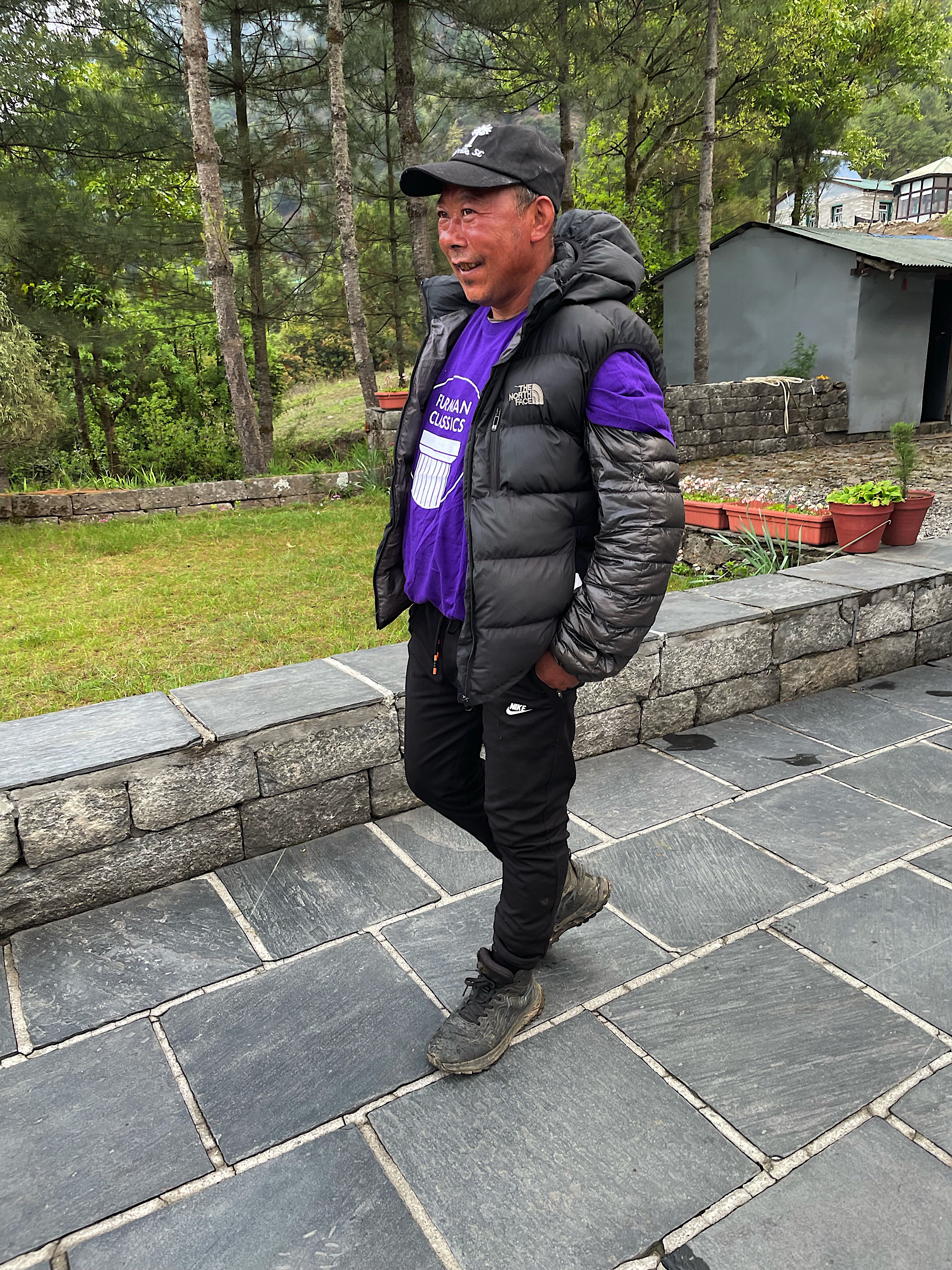 Mila Dai was delighted to receive a purple Furman University t-shirt; he put it right on to wear to dinner.